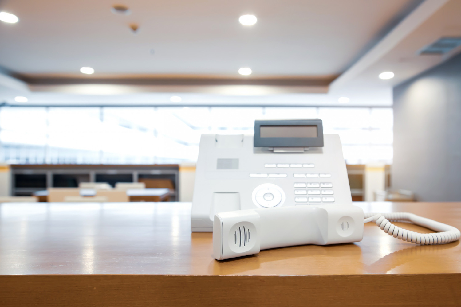 VitalPBX for K-12 School Districts | E911-Ready Phone System 2 Front office desk phone at a school